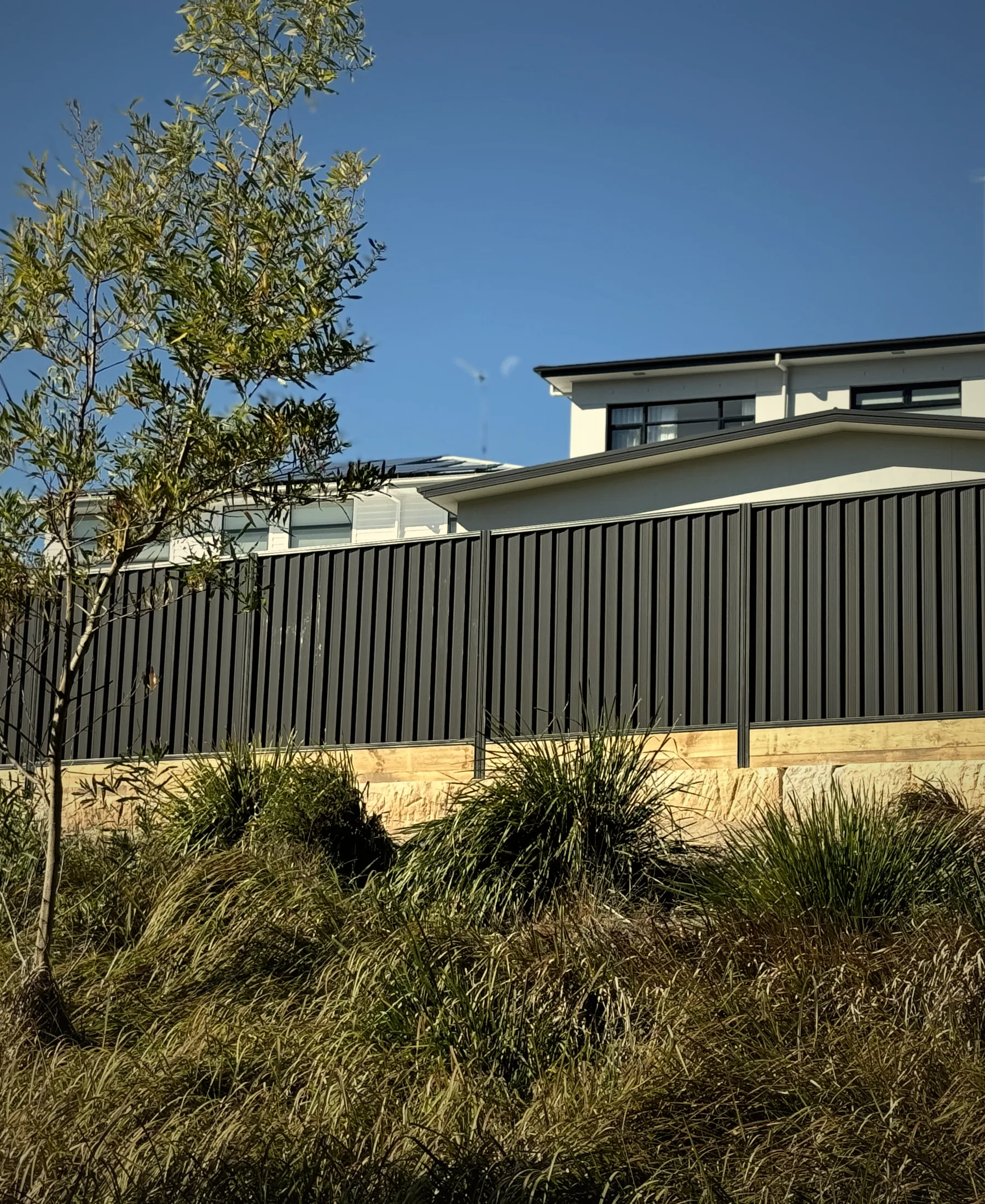 Residential landscaping and exterior construction work in progress